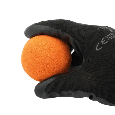 3 Inch Spherical Cleanout Sponge Ball For Concrete Pumps held in black gloved hand, showing durable material