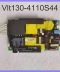 Solid Workhorse Industrial Power Supply VLT130 4110S44 Compact AC DC Converter Box top view showing circuit components and connectors.