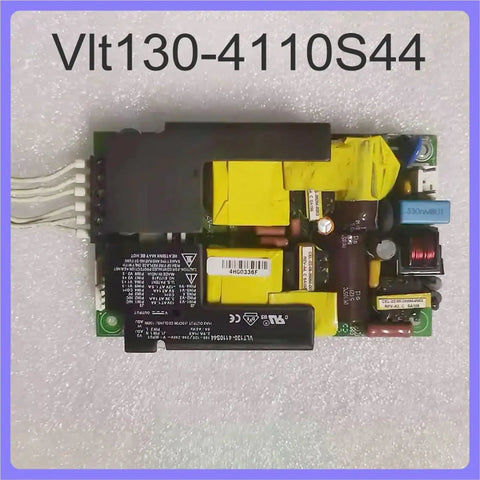 Solid Workhorse Industrial Power Supply VLT130 4110S44 Compact AC DC Converter Box top view showing circuit components and connectors.