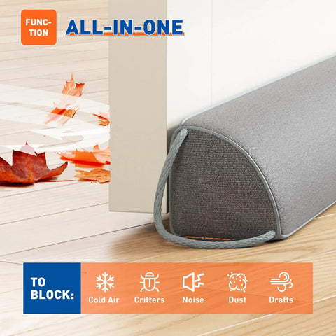 Heavy Duty Triangular Under Door Draft Stopper Works Like A Charm By Plugging Cold Drafts And Road Noise With A Weighted Core That Slides Right Into Place On Any Surface In Cool Gray next to door with autumn leaves.