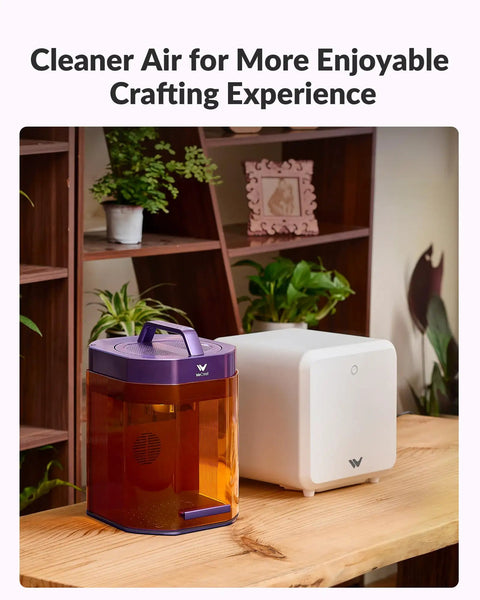 Top Shelf Five Stage Fume Extractor For WeCreat Lumos Laser Engraver, compact design with orange and white units on a wooden table.