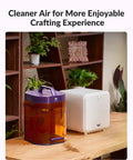 Heavy Duty Fume Extractor With No Hassle Filter Swap Designed For WeCreat Lumos Series Laser Engravers, orange and white air purifier.