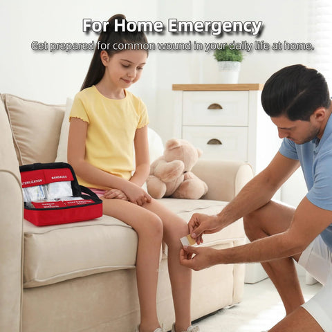 330 Piece First Aid Kit, red waterproof compact case opened with bandages; man applies a bandage to girl's knee.