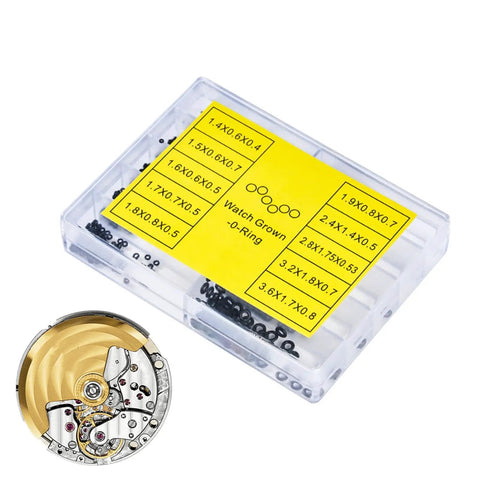 Box of 500 Pro Grade Rubber O Rings And Seal Washers Set For Watch Repair next to watch movement, waterproof gasket kit