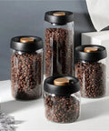 Turn Up Your Kitchen Game With This Super Durable Vacuum Sealed Glass Jar Built For Coffee Beans And Dry Goods. 1200Ml clear jars filled with coffee beans.
