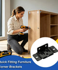 Woman using power drill to install beefy heavy duty steel corner brace bracket for hidden mounting and furniture repair.