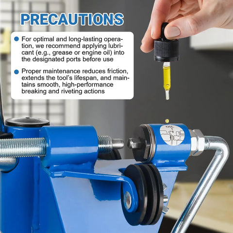 2 In 1 Chainsaw Chain Breaker And Spinner Tool Kit with lubrication instructions on a blue cast iron tool in workshop.