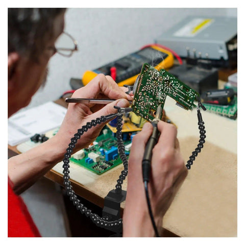 Third Hand Soldering Station with Adjustable Gooseneck Arms holds PCB for electronics repair, secure support shown.