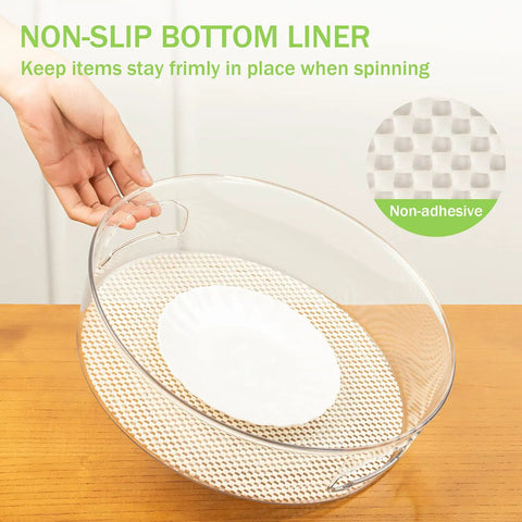 Round 12 Inch Lazy Susan Organizer With Non Skid Liners And Handle, clear spinning turntable on wooden surface