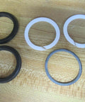 Hydraulic seal kit P-106872-K0002 replacement P106872K0002 single pack with O-rings and seals on wooden surface