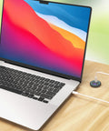Heavy Duty 12V USB C Outlet Pushes Out Slick 65W PD3.0 And 18W Quick Charge 3.0 waterproof socket connected to a laptop charging.