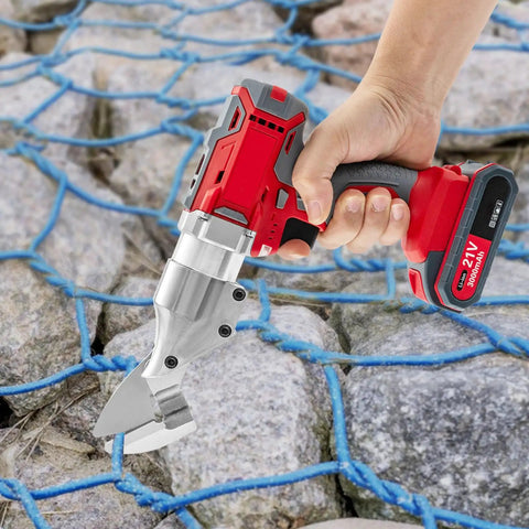 21V Cordless Electric Tin Snips Brushless Metal Shears Heavy Duty Sheet Metal Cutter held above ground with blue netting.