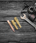 Sheet Metal Dent Repair Kit With Chuck Stud Welder And Dent Puller Set on wooden background, includes soldering iron tips and wrench.