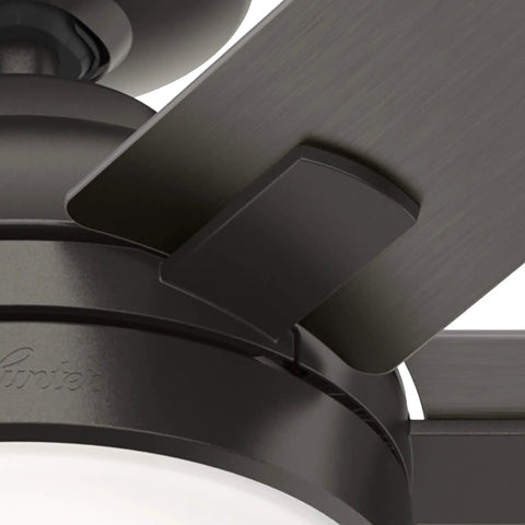 Close-up of Indoor Ceiling Fan With LED Light In Rustic Bronze Finish, showing detailed blade attachment and motor housing.
