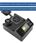 Real Deal Portable J1772 Electric Vehicle Charger Tester With Built In Resistive Load And Vehicle Simulator ready for field testing, showing connectors and LCD.