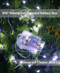 Two Pack 33 Ft 100 LED Battery Operated Fairy String Lights with Remote Waterproof in plants
