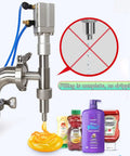 Liquid Filling Machine For Viscous Pastes And Sauces With Digital Metering shows stainless steel spout filling honey without dripping.