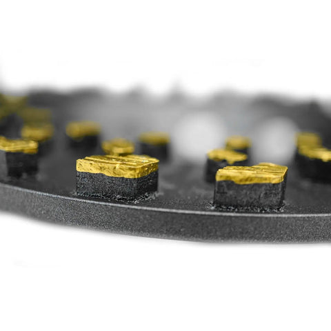 Close-up of 5 Inch Diamond Cup Grinding Wheel For Concrete And Coatings Removal, Tackling Paint, Epoxy, Glue, And Mastic With CDB Cluster Diamond Brazing Technology.