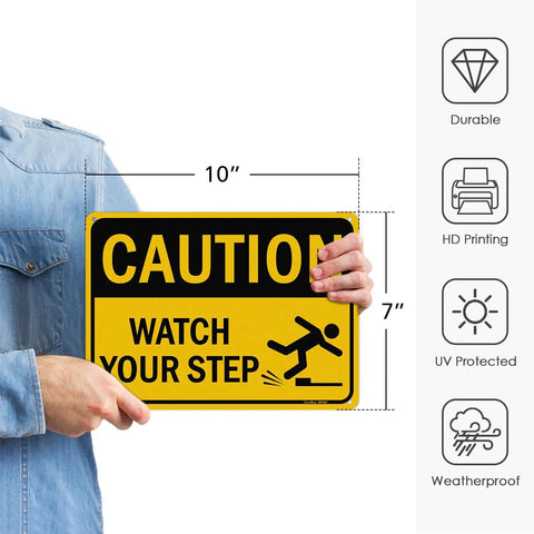 Person holding Watch Your Step Caution Sign 10 By 7 Inches Reflective Aluminum Safety Sign For Outdoor And Indoor Use