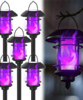 Six Pack Solar Flame Torch Lights Outdoor Dual Use Flickering Purple Flame Garden Lanterns Auto On Off Waterproof Halloween Lighting For Lawn Patio Yard Walkway Driveway, showing six lanterns with purple flames