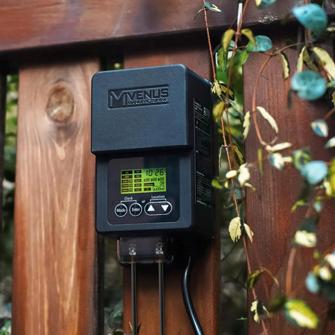 Outdoor Low Voltage Transformer 60W With Timer And Built In Photo Sensor mounted on wooden fence