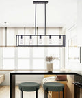 Farmhouse Rectangle Chandelier With Adjustable Height Matte Black 5 Light Industrial Pendant Lighting For Dining Room Kitchen Island And Foyer A Modern Rustic Ceiling Fixture hanging over a kitchen island.