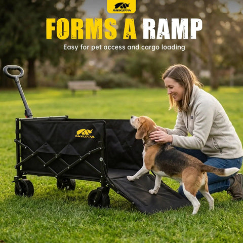 Foldable Dog Wagon Cart With Drop-Down Tailgate, Heavy Duty All-Terrain Wheels in park with dog using tailgate ramp