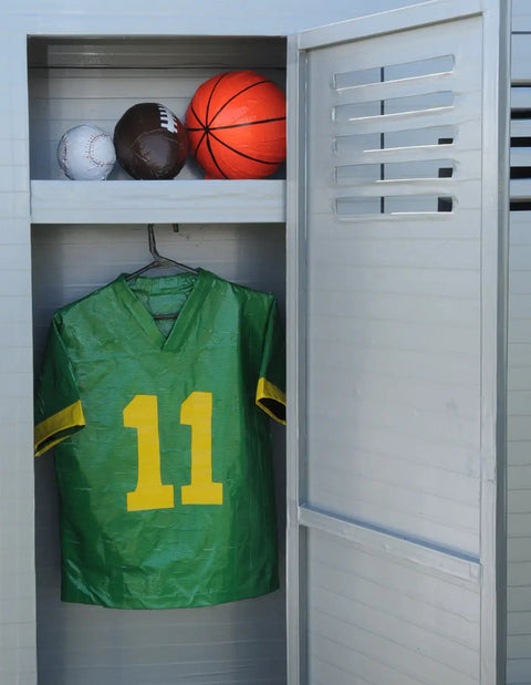 Open locker with sports balls and green football jersey number 11