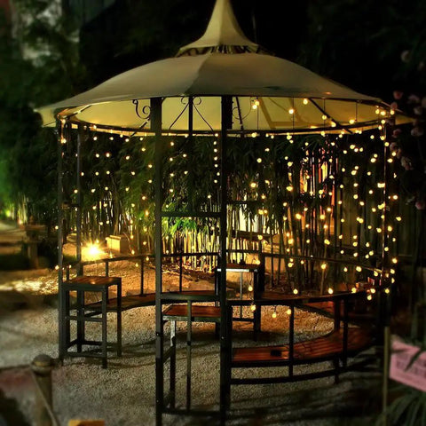 Gazebo adorned with Solar String Lights Outdoor Waterproof 56ft 100 LED Globe Lights With 8 Modes Auto On Off Warm White