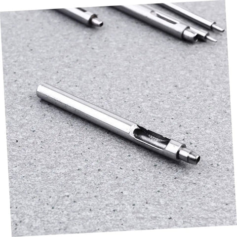Metal Leather Round Punch Tool Belt Hole Punch For Falconry Hobbies Crafts And DIY Projects, close-up on textured surface.