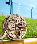 Mechanical Monowheel 3D Puzzle Kit Unicycle Style Wooden Steampunk Build For Adults Self Rolling Brain Teaser Model Kit Made Of Wood, wooden model on grass