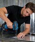 A man using The 21V Cordless Power Drill Kit Is A Solid Heavy Lifter Featuring Brushless Motor 2 Speed Settings For Hassle Free Metal And Concrete Jobs Powered By A Rechargeable Battery That Handles Everything on metal.