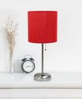Red fabric shade on sleek brushed steel table lamp with built-in charging outlet, modern desk light for home office and living rooms.