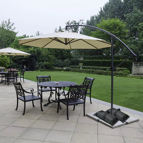 Fillable Sandbag Base Weights For Patio Umbrella, Set Of 2, Each Holds 30 Lbs, Heavy Duty Oxford Cloth, shown in garden setup