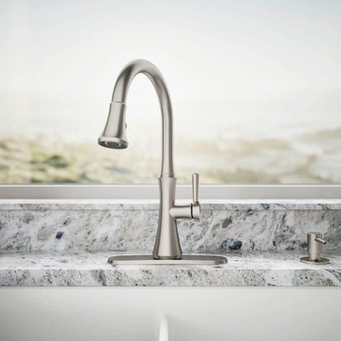 Kaori Single Handle Kitchen Faucet With Pull Down Sprayer And Soap Dispenser In Vibrant Stainless Finish installed on granite countertop