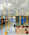 Drone Racing Obstacle Course Kit for Beginners and Pros set up with cones and hoops in an indoor gym area.