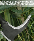 High Manganese Steel Double Scythe With Wooden Handle for outdoor weeding and grass mowing, close-up of curved blade
