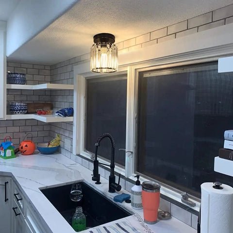 Compact Silver Modern Semi Flush Mount Ceiling Light Fixture With Chrome Finish in a kitchen above a sink