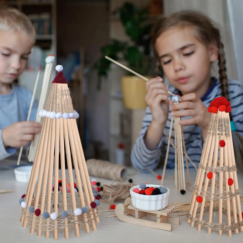 Premium Unfinished Wooden Dowel Rods Top Notch For Knocking Out Weekend Diy Crafts And Home Decor Upgrades Along With Party Displays Featuring Smooth Quarter Inch By Six In Sticks used in kids' craft projects.