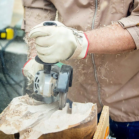 User operating No Bull 4 Inch 14 Tooth Carving Saw Disc For Angle Grinders, carving wood with precision.