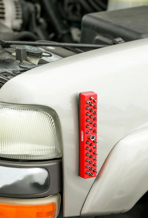 34 Piece Tool Accessory Set With Socket Adapters, Universal Joints, Bit Holders And Bits, Magnetic Organizer on car hood
