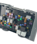 Real Deal Engine Fuse Box Assembly 19210438 For 2007 2009 Chevy Silverado GMC Sierra with colorful fuses and relays.