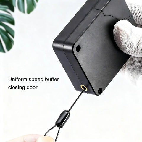 Retractable Door Closer No Drill 1200g Tension With Steel Drawstring for Sliding Glass Screen Doors held by gloved hand