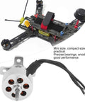 Beefy Ultra Lightweight Mini Brushless RC Plane Motor Kit 1811 3900KV Sensorless placed next to a quadcopter frame.