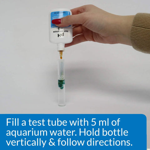 Totally Trustworthy Freshwater Aquarium PH Test Kit Delivering 250 Hassle Free Reads with solution bottle over test tube.