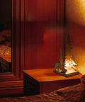 Woodsy Bear Silhouette Table Lamp on bedside, metal, black, 8L x 4W x 12.25H, cozy rustic vibe in cabin-themed bedroom