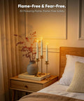 Bedroom scene with 6 Pack Wax Flameless Taper Candles With Remote Timer And Dimmer, Ivory LED Candle Sticks on nightstand.