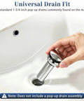 IBVIVIC Undermount Bathroom Sink, 14.4x12.7 Inch White Rectangle Porcelain Ceramic Vessel Sink showing universal drain fit in hand.