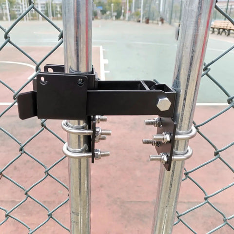 Tough As Nails Double Gate Latch Fits 1-1/4 Inch Chain Link Posts With Heavy Duty Strong Arm And Lock Down Padlock Holes Ready For Ranch Farm Or Backyard Gates In Matte Black, installed on chain link fence.