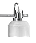 Close-up of Archie Collection 3 Light Clear Double Prismatic Glass Coastal Bath Vanity Light in Polished Chrome Finish.